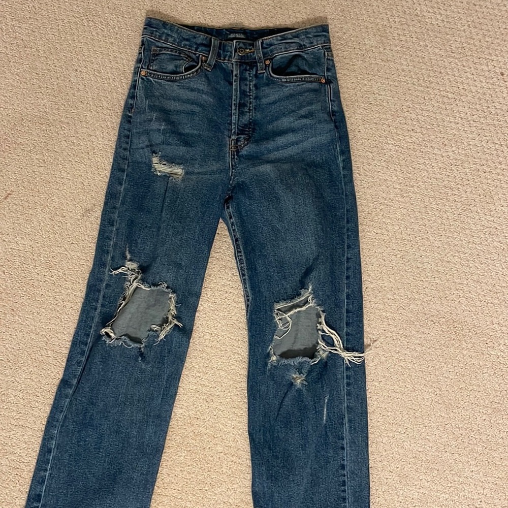 ripped dark wash wide leg jeans. size 4